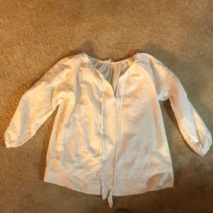 white blouse with stitched details